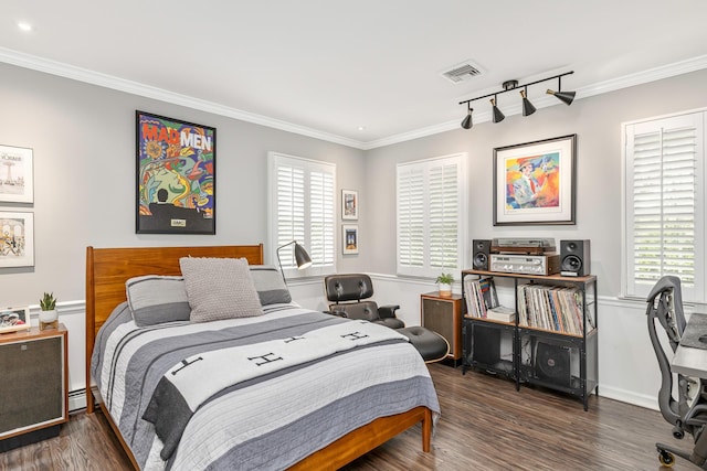 15 Hermitage St, Wading River, NY 11792 - bedroom with ornamental molding, wood finished floors, multiple windows, a baseboard heating unit, and recessed lighting