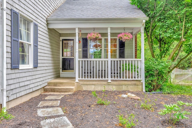 15 Hermitage St, Wading River, NY 11792 - entrance to property featuring covered porch and roof with shingles