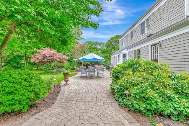 15 Hermitage St, Wading River, NY 11792 - view of patio with outdoor dining space