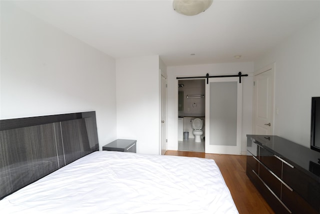 132-35 41st Rd Unit 5D, Flushing, NY 11355 - bedroom featuring wood finished floors and a barn door