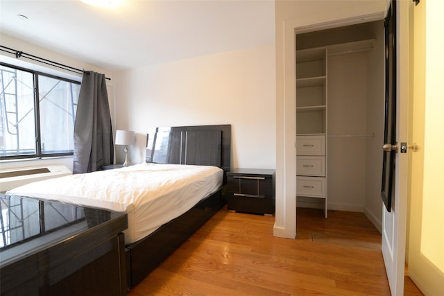 132-35 41st Rd Unit 5D, Flushing, NY 11355 - bedroom with light wood-type flooring