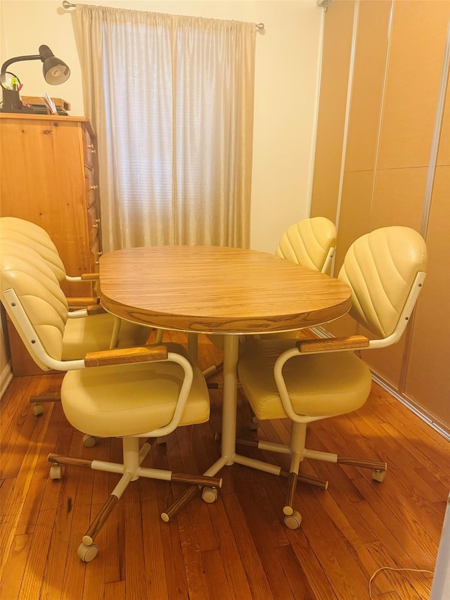118-60 Metropolitan Ave Unit 1J, Kew Gardens, NY 11415 - dining space featuring hardwood / wood-style flooring