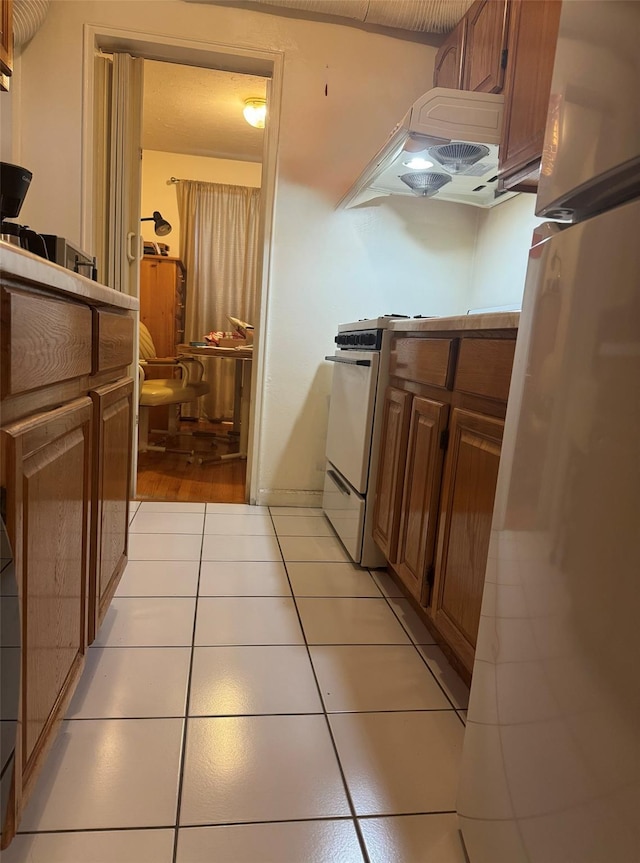 118-60 Metropolitan Ave Unit 1J, Kew Gardens, NY 11415 - washroom featuring light tile patterned floors