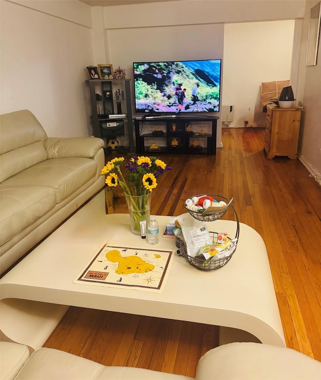 118-60 Metropolitan Ave Unit 1J, Kew Gardens, NY 11415 - living room with hardwood / wood-style floors