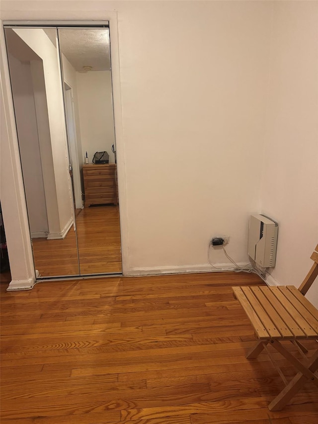 118-60 Metropolitan Ave Unit 1J, Kew Gardens, NY 11415 - washroom with wood finished floors and baseboards