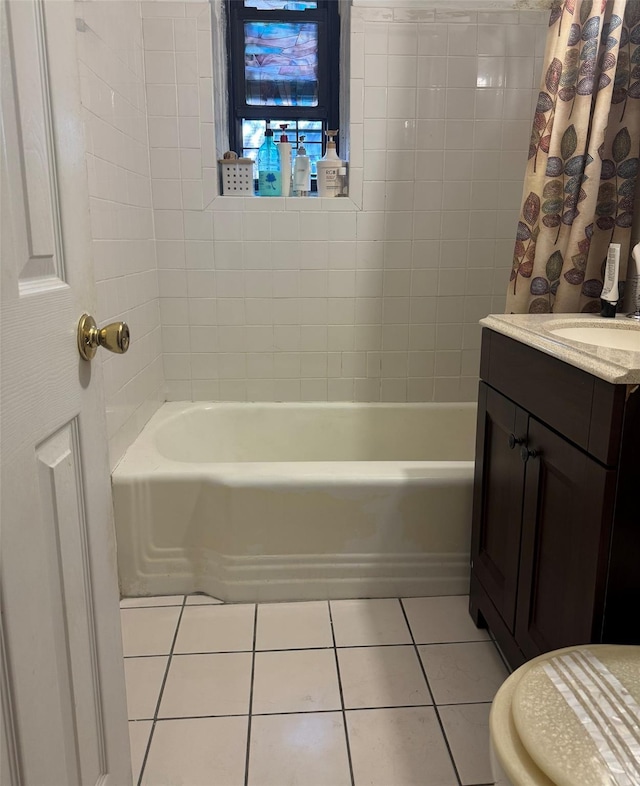 118-60 Metropolitan Ave Unit 1J, Kew Gardens, NY 11415 - bathroom featuring tile patterned flooring, shower / tub combo with curtain, vanity, and toilet