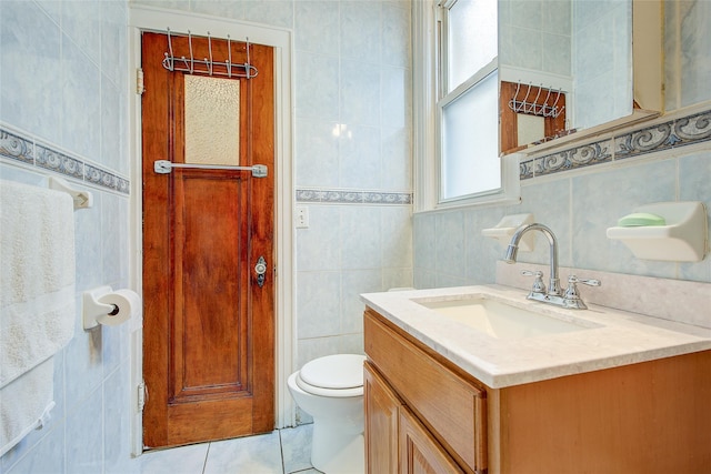 56-20 68th St, Maspeth, NY 11378 - bathroom with vanity, tile walls, and tile patterned floors