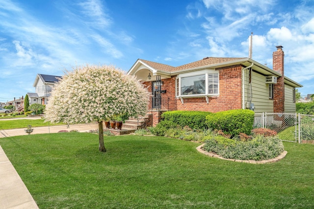 3324 Murdock Ave, Oceanside, NY 11572 - view of front facade with a chimney, brick siding, and concrete driveway