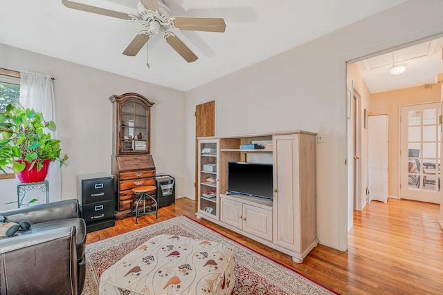 3324 Murdock Ave, Oceanside, NY 11572 - living area with light wood-type flooring, attic access, and ceiling fan