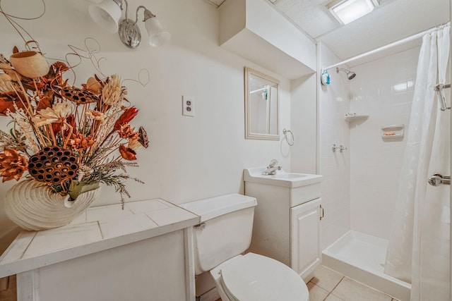 3324 Murdock Ave, Oceanside, NY 11572 - bathroom with vanity, tile patterned floors, and a tile shower
