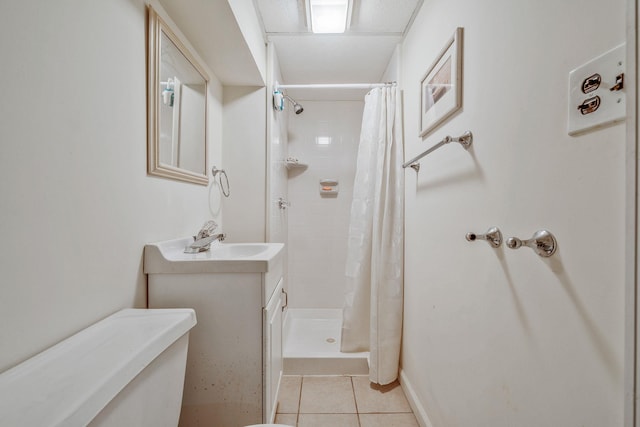 3324 Murdock Ave, Oceanside, NY 11572 - full bathroom with tile patterned flooring, a tile shower, and vanity