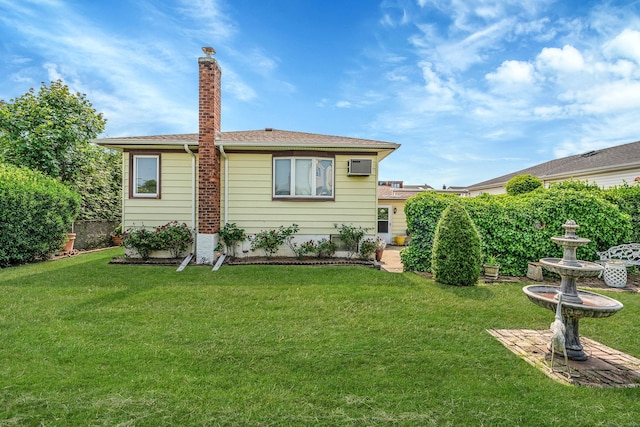 3324 Murdock Ave, Oceanside, NY 11572 - rear view of house with an AC wall unit and a chimney