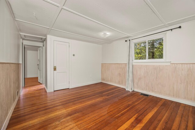 252 Ernest Rd, Millbrook, NY 12545 - unfurnished room with wood-type flooring, wainscoting, and wooden walls