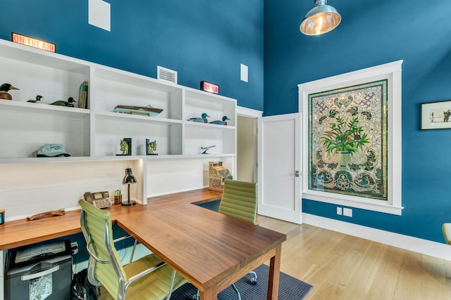 120 Cambon Ave, Saint James, NY 11780 - office with wood finished floors and a towering ceiling