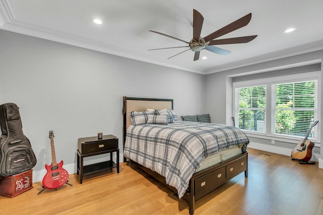120 Cambon Ave, Saint James, NY 11780 - bedroom featuring light wood-style floors, recessed lighting, crown molding, and a ceiling fan