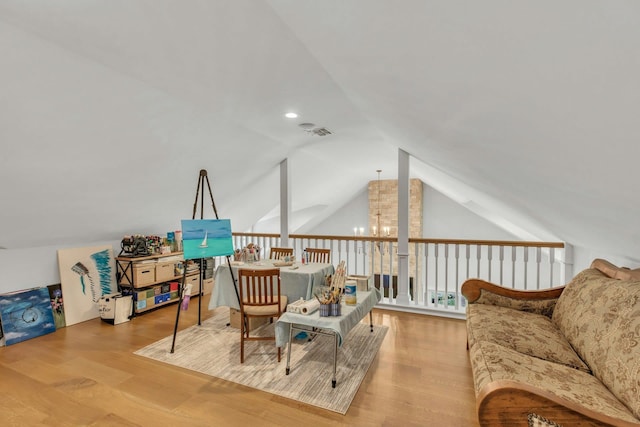 120 Cambon Ave, Saint James, NY 11780 - additional living space with vaulted ceiling and wood finished floors