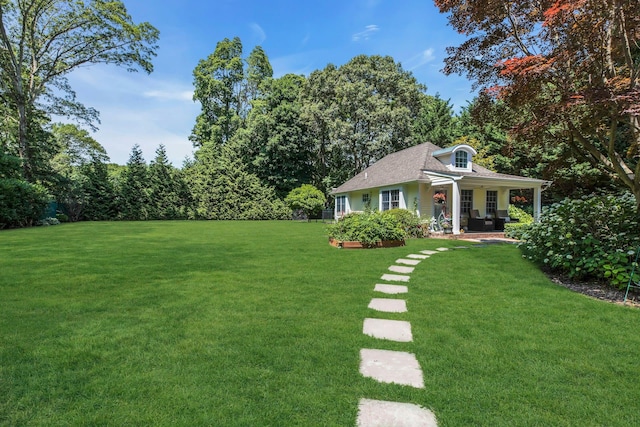 120 Cambon Ave, Saint James, NY 11780 - view of grassy yard featuring a porch