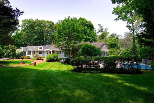 100 Gristmill Ln, Manhasset, NY 11030 - view of front of house featuring a front lawn