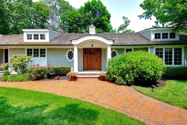100 Gristmill Ln, Manhasset, NY 11030 - view of front of house with a front yard
