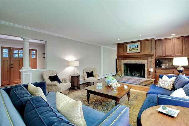 100 Gristmill Ln, Manhasset, NY 11030 - living room with a baseboard heating unit, decorative columns, recessed lighting, ornamental molding, and light wood-style floors