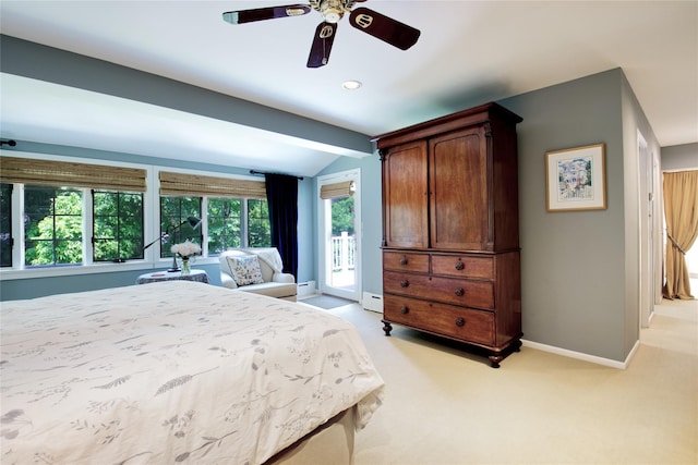100 Gristmill Ln, Manhasset, NY 11030 - bedroom featuring vaulted ceiling, a baseboard radiator, light carpet, access to exterior, and a ceiling fan