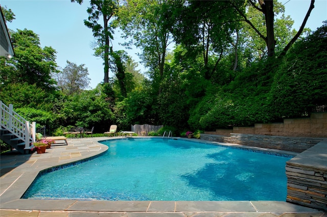 100 Gristmill Ln, Manhasset, NY 11030 - outdoor pool with a patio and stairway