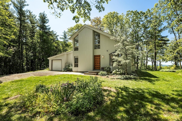 66 Beacon Hill Rd, Call Listing Agent, NY 12060 - mid-century inspired home with driveway, a garage, and a front lawn