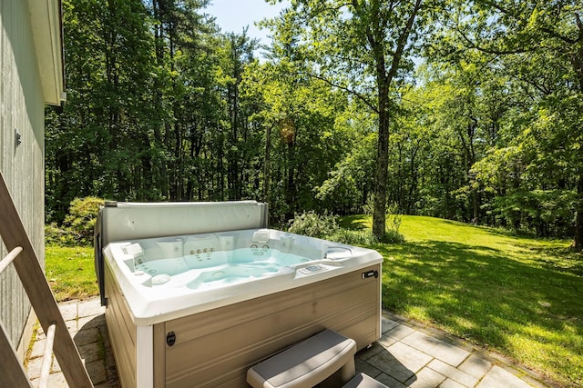 66 Beacon Hill Rd, Call Listing Agent, NY 12060 - view of patio featuring a hot tub and a forest view