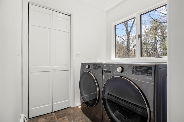 66 Beacon Hill Rd, Call Listing Agent, NY 12060 - laundry area with separate washer and dryer, dark stone finish flooring, and baseboards