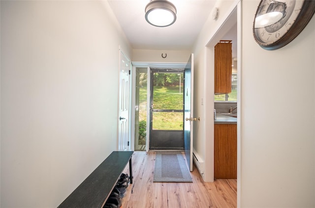 331 Heritage Hls Unit A, Somers, NY 10589 - doorway to outside with light wood finished floors