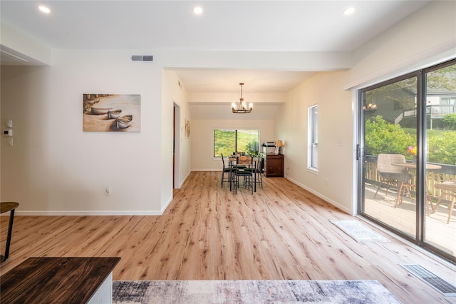 331 Heritage Hls Unit A, Somers, NY 10589 - dining area featuring light wood-type flooring, a chandelier, baseboards, and recessed lighting