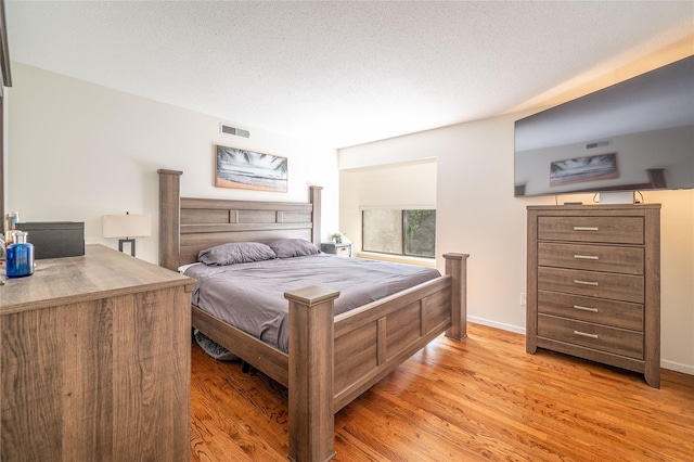 331 Heritage Hls Unit A, Somers, NY 10589 - bedroom with light wood finished floors and baseboards