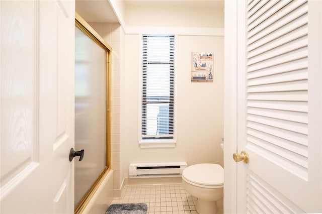 331 Heritage Hls Unit A, Somers, NY 10589 - bathroom with a baseboard radiator, tile patterned flooring, toilet, and shower / bath combination with glass door