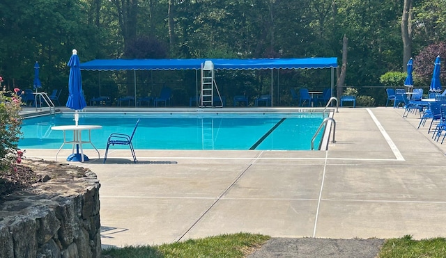 331 Heritage Hls Unit A, Somers, NY 10589 - community pool with a patio area