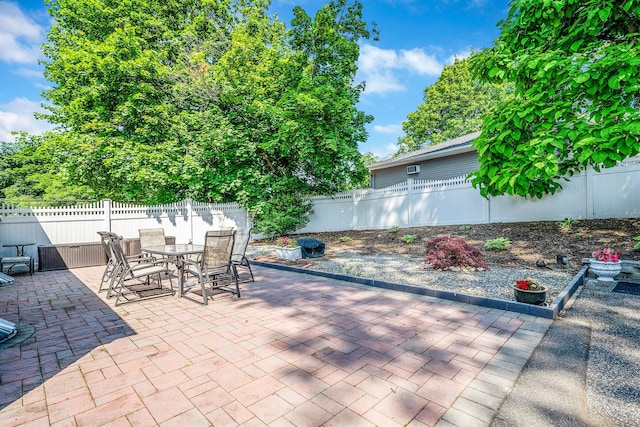 191 Laurel Rd, East Northport, NY 11731 - fenced backyard featuring a patio and outdoor dining area