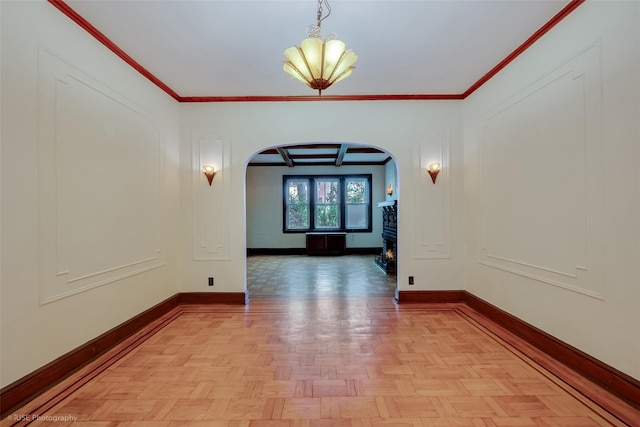3916 51st St, Woodside, NY 11377 - empty room featuring arched walkways, a chandelier, and ornamental molding