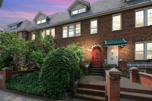 3916 51st St, Woodside, NY 11377 - view of front facade featuring brick siding and entry steps