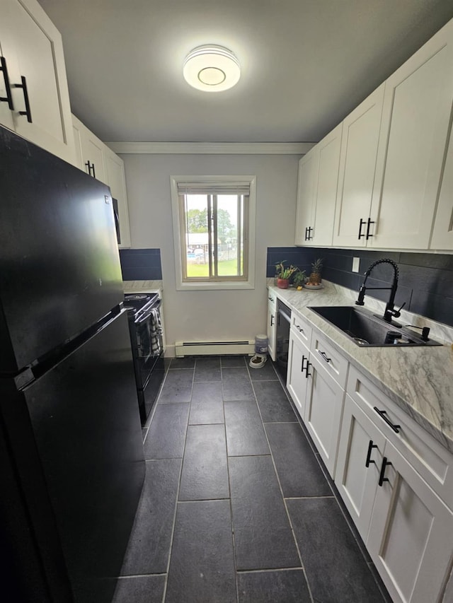 2445 Union Blvd Unit 7A, Islip, NY 11751 - kitchen with black appliances, white cabinets, a baseboard heating unit, dark tile patterned floors, and backsplash