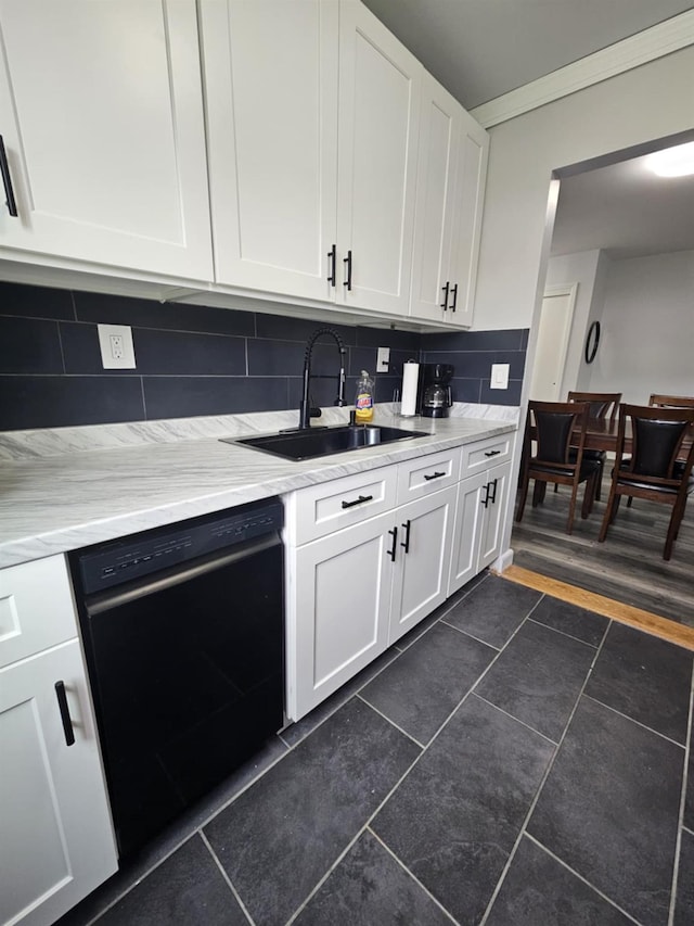2445 Union Blvd Unit 7A, Islip, NY 11751 - kitchen featuring black dishwasher, backsplash, white cabinetry, dark tile patterned flooring, and ornamental molding