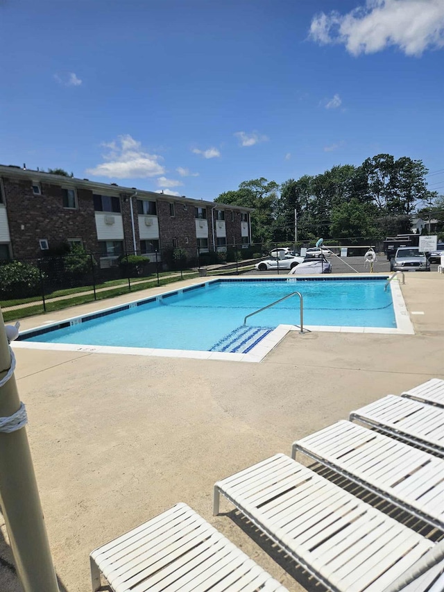 2445 Union Blvd Unit 7A, Islip, NY 11751 - community pool featuring a patio