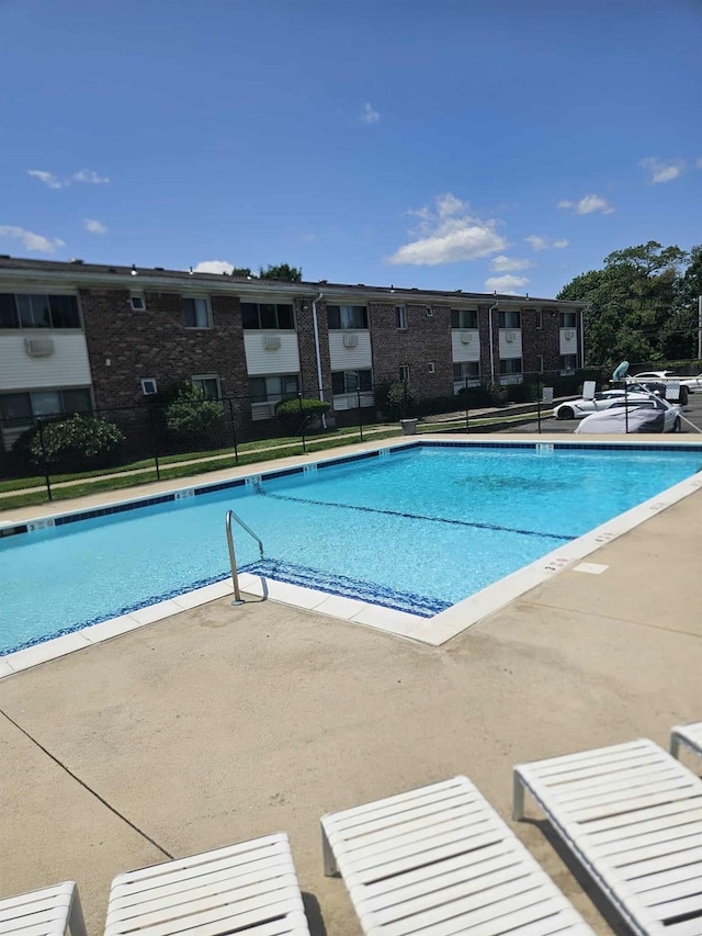 2445 Union Blvd Unit 7A, Islip, NY 11751 - community pool featuring a patio