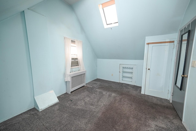 1078 Hancock Ave, Franklin Square, NY 11010 - bonus room featuring lofted ceiling, a skylight, carpet flooring, radiator heating unit, and cooling unit