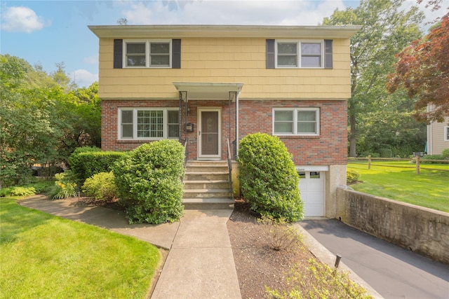 17 Shady Ln, Scarsdale, NY 10583 - colonial inspired home with driveway, brick siding, a garage, and a front yard