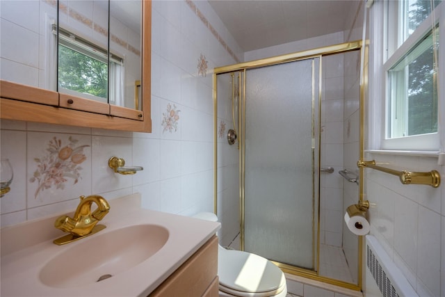 17 Shady Ln, Scarsdale, NY 10583 - full bath with tile walls, a stall shower, vanity, and radiator
