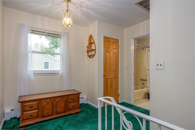 17 Shady Ln, Scarsdale, NY 10583 - hall with dark colored carpet, baseboard heating, and a baseboard radiator