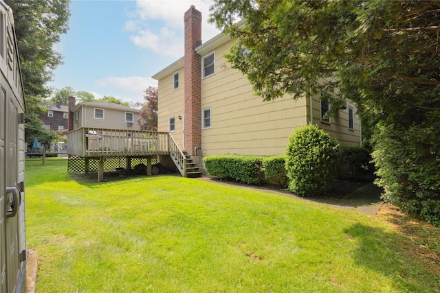 17 Shady Ln, Scarsdale, NY 10583 - view of grassy yard with a wooden deck
