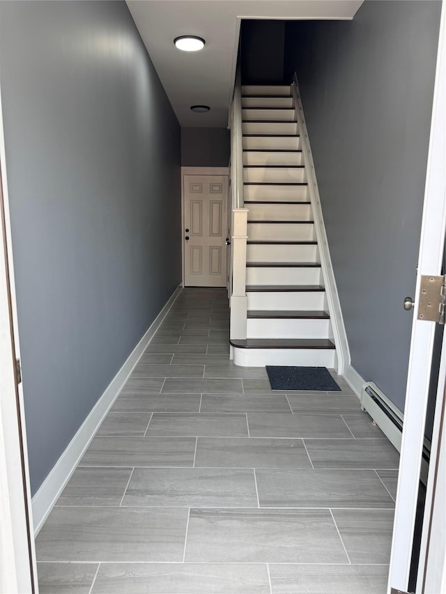 1140 Sutter Ave, Brooklyn, NY 11208 - stairway featuring wood finish floors and baseboard heating