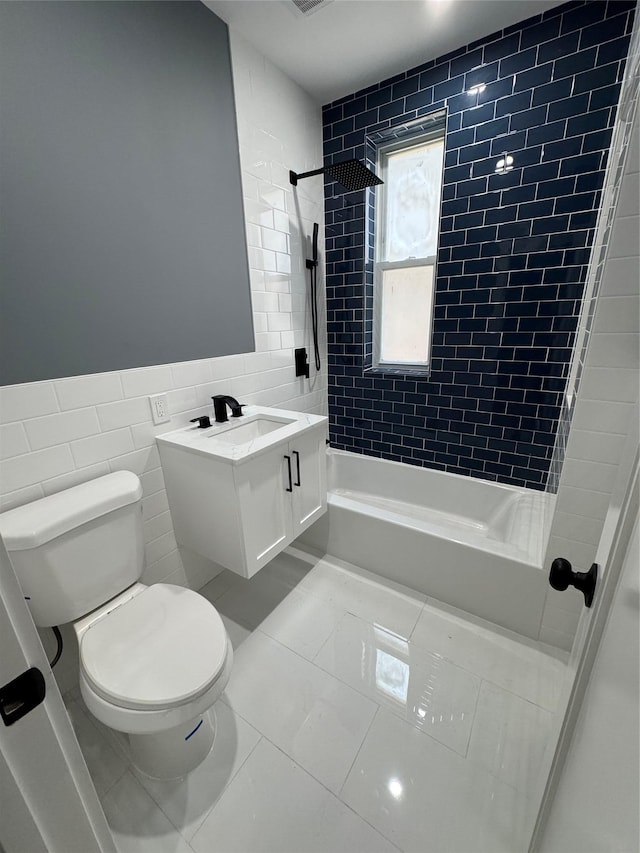 1140 Sutter Ave, Brooklyn, NY 11208 - full bath with tile walls, shower / washtub combination, tile patterned floors, and vanity