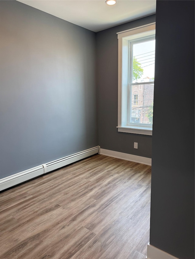1140 Sutter Ave, Brooklyn, NY 11208 - unfurnished room featuring wood finished floors, recessed lighting, and baseboard heating