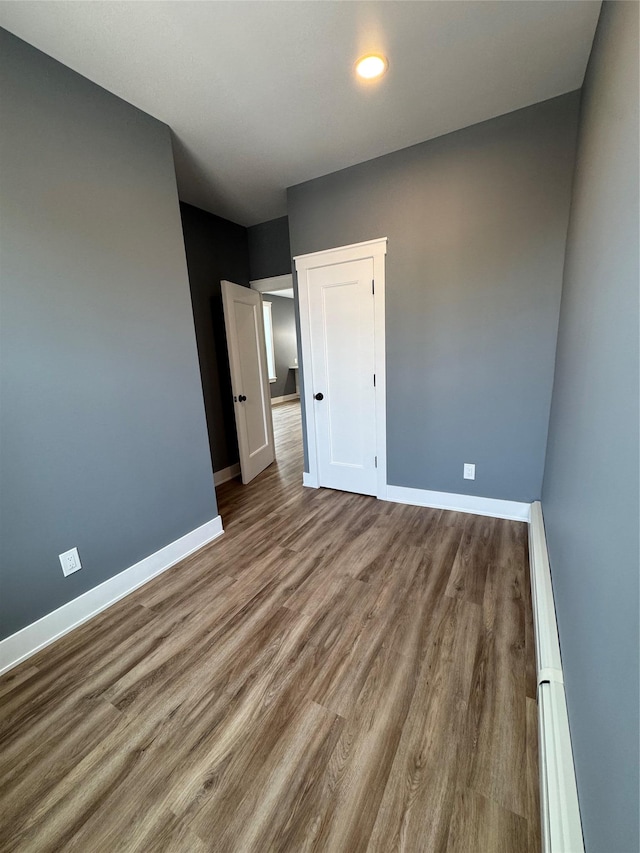 1140 Sutter Ave, Brooklyn, NY 11208 - unfurnished bedroom featuring wood finished floors and recessed lighting